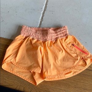 Orange lululemon size 6 shorts